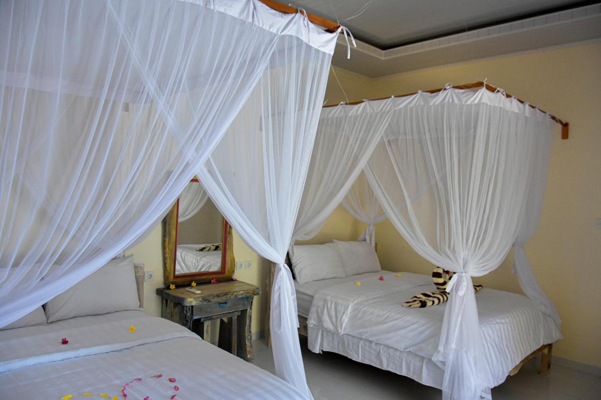 Hotel Ganesha Amed Habitación foto