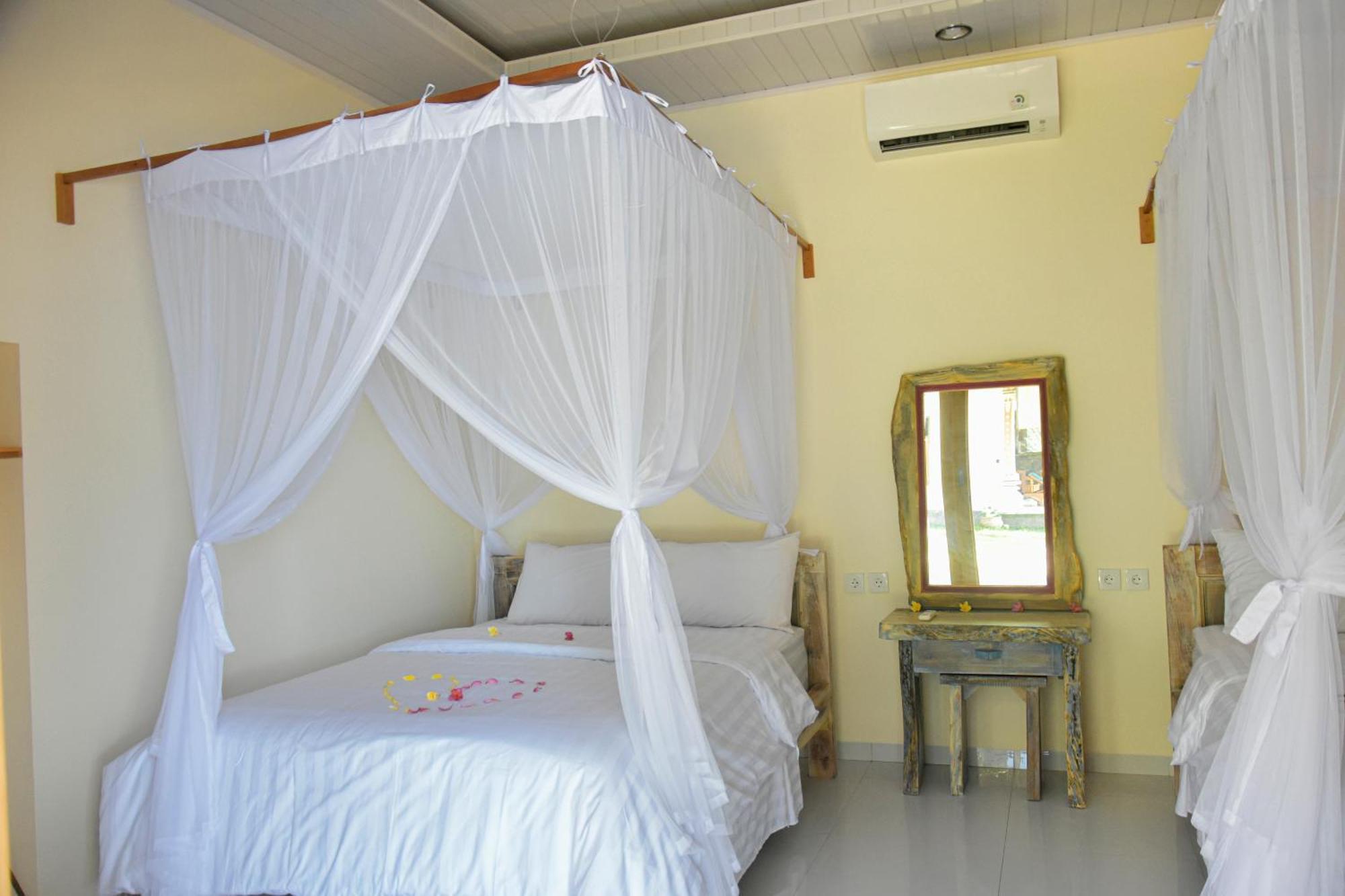Hotel Ganesha Amed Habitación foto