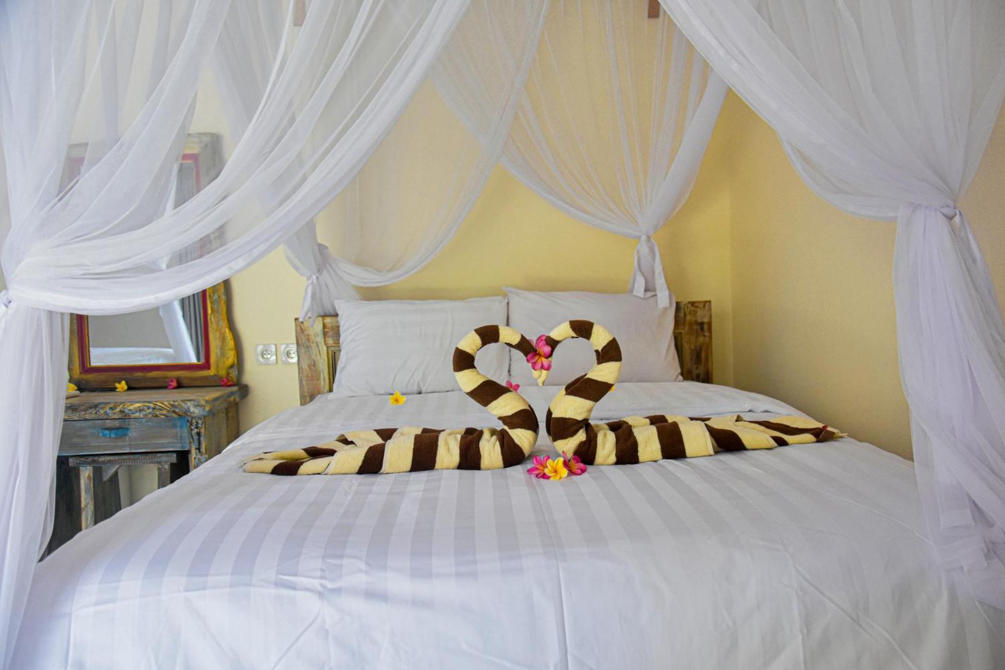 Hotel Ganesha Amed Habitación foto